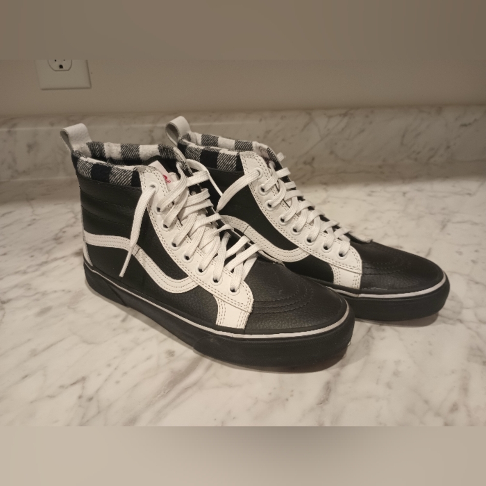 Vans Black and White High-Top Sneakers